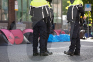 Dublin sends in police and buses to dismantle tent city