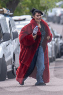 EXCLUSIVE: Singer Raye Wears A Red Faux Fur Coat As She Is Spotted On The Way To Film A New Music Video At The Shepherds Bush Empire - 01 May 2024