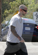 *EXCLUSIVE* Adam Levine wears ultra-baggy jeans as he pops into a babrber shop for a quick head-shave in Montecito