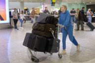 EXCLUSIVE: LeAnn Rimes Is Laden Down With Luggage As She Arrives In The UK - 2 May 2024
