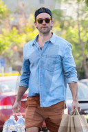 *EXCLUSIVE* Chace Crawford has his hands full during a solo shopping trip in LA