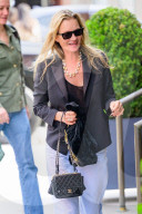 *EXCLUSIVE* Kate Moss Stuns in Casual Chic Ensemble with Signature Chanel Bag at NYC Hotel