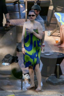 *EXCLUSIVE* Jessie J enjoys a day by the pool in a colorful towel while in Rio!