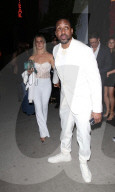 *EXCLUSIVE* Jaleel White and his new fiancé leave their rehearsal dinner at Catch Steak in matching white outfits! **WEB MUST CALL FOR PRICING**