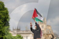 Pro-Palestinian protesters outside Cambridge University in Cambridge, UK.