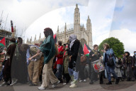 Pro-Palestinian protesters outside Cambridge University in Cambridge, UK.