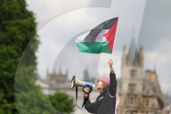 Pro-Palestinian protesters outside Cambridge University in Cambridge, UK.