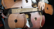Musician creates 109 string guitar harp hybrid