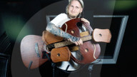 Musician creates 109 string guitar harp hybrid