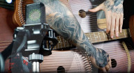 Musician creates 109 string guitar harp hybrid