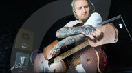 Musician creates 109 string guitar harp hybrid