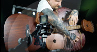 Musician creates 109 string guitar harp hybrid