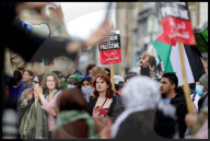 Pro-Palestinian protesters outside Cambridge University in Cambridge, UK.