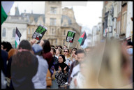Pro-Palestinian protesters outside Cambridge University in Cambridge, UK.
