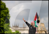 Pro-Palestinian protesters outside Cambridge University in Cambridge, UK.