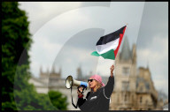 Pro-Palestinian protesters outside Cambridge University in Cambridge, UK.