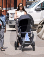 EXCLUSIVE: Pregnant Lea Michele Wears A Figure Hugging Cream Dress On Sunny Day In NYC - 08 May 2024