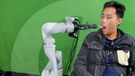 Robot feeder for disabled controlled by tongue
