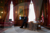 Foreign Secretary David Cameron records social media clips