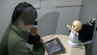 Robot language tutor outdoes human led class