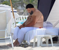 *EXCLUSIVE* DJ Khaled Shirtless on a Public Beach By Himself