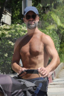 *EXCLUSIVE* Chris Diamantopoulos enjoys a shirtless walk with a pal in sunny Los Feliz