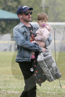*EXCLUSIVE* Macaulay Culkin spotted holding Son Carson at big brother’s soccer game in Studio City