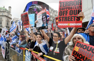 Enough Is Enough Pro Israeli counter protest facing a pro Palestine march through central London, UK.