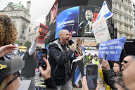 Enough Is Enough Pro Israeli counter protest facing a pro Palestine march through central London, UK.