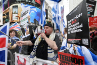 Enough Is Enough Pro Israeli counter protest facing a pro Palestine march through central London, UK.