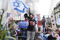 Enough Is Enough Pro Israeli counter protest facing a pro Palestine march through central London, UK.