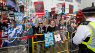 Enough Is Enough Pro Israeli counter protest facing a pro Palestine march through central London, UK.