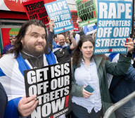 Enough Is Enough Pro Israeli counter protest facing a pro Palestine march through central London, UK.