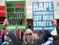 Enough Is Enough Pro Israeli counter protest facing a pro Palestine march through central London, UK.