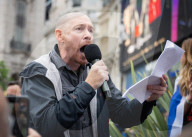 Enough Is Enough Pro Israeli counter protest facing a pro Palestine march through central London, UK.