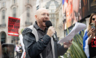 Enough Is Enough Pro Israeli counter protest facing a pro Palestine march through central London, UK.