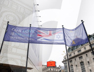 Enough Is Enough Pro Israeli counter protest facing a pro Palestine march through central London, UK.