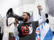 Enough Is Enough Pro Israeli counter protest facing a pro Palestine march through central London, UK.