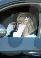 *EXCLUSIVE* Melanie Griffith Cruises Through LA Traffic with Wrapped Bruised Hands and a Cigarette
