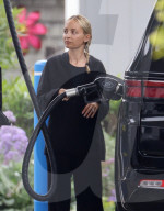 *EXCLUSIVE* Makeup free Nicole Richie gases up her $116,000 Grand Wagoneer SUV