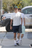 *EXCLUSIVE* Romeo Beckham hits West Hollywood shops with pals in crisp white tee and navy shorts