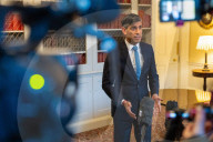 The Prime Minister Rishi Sunak reacts to inflation figures