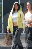 *EXCLUSIVE* Kylie Jenner shows off her toned tummy while stopping by Erewhon Market with her best friend Stassie Karanikolaou