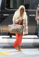 *EXCLUSIVE* Jessica Simpson shows off her 100 pound weight loss as she catches a flight out of Los Angeles in a vintage faux fur coat and long dress.