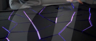 Interactive table has shape shifting surface and lights display