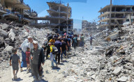 Gazans return to Jabalia                                                                                                                        homes following the withdrawal of the Israeli army from the Jabalia area in the northern Gaza Strip