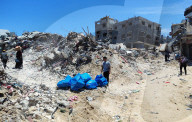 Gazans return to Jabalia                                                                                                                        homes following the withdrawal of the Israeli army from the Jabalia area in the northern Gaza Strip