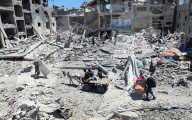 Gazans return to Jabalia                                                                                                                        homes following the withdrawal of the Israeli army from the Jabalia area in the northern Gaza Strip