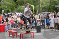 Street Performer Entertains A Crowd In Unionville