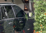 *EXCLUSIVE* OOPS! Jennifer Lopez's assistant hits the passenger side mirror of her Escalade while leaving a house in LA
